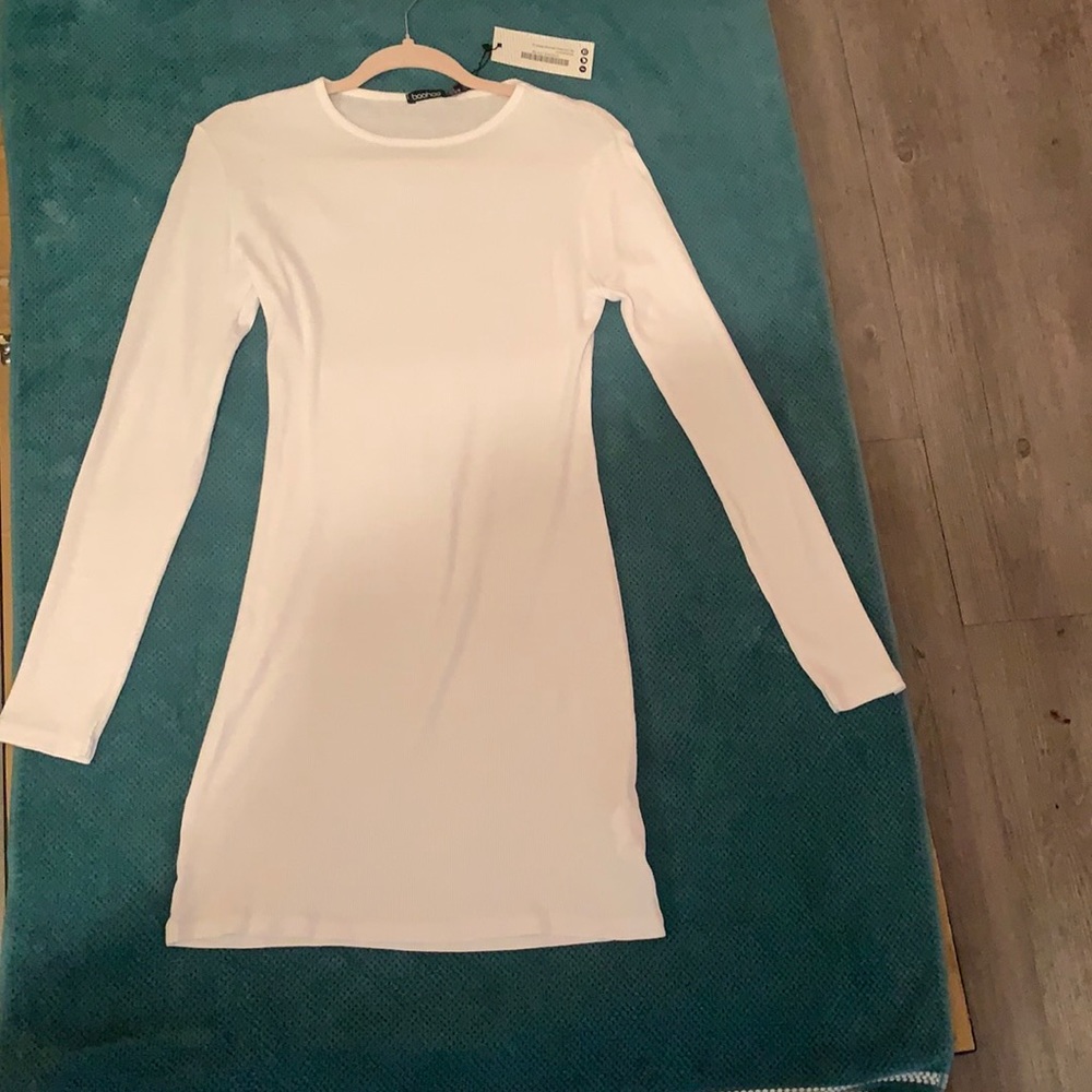 Ribbed long sleeve white mini dress. Never worn.